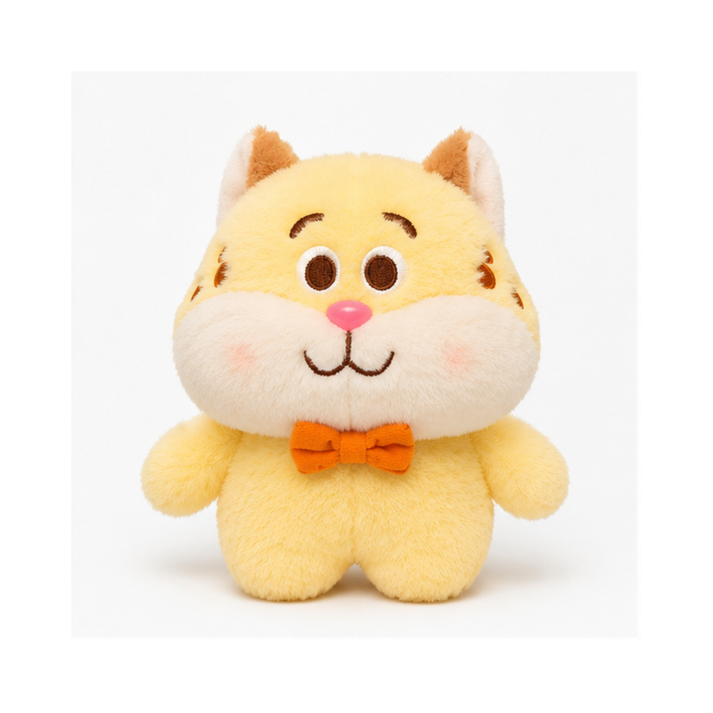 Soft toy cat with bow