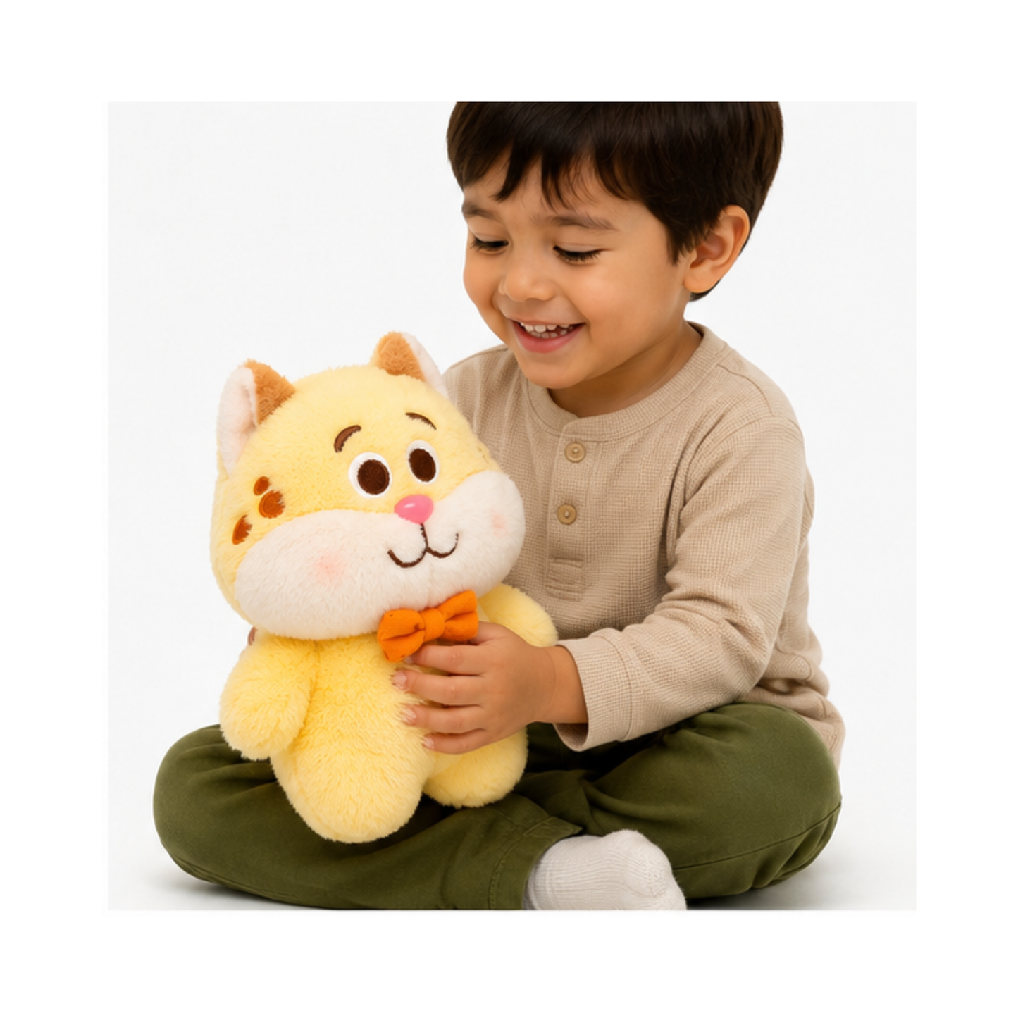 Soft toy cat with bow